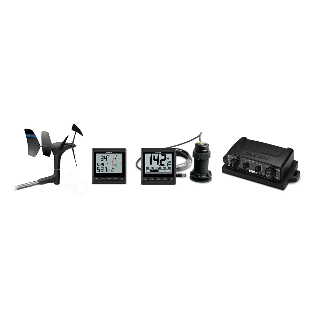 A wind gauge, two black displays ,and a receiver equipment for marine navigation.